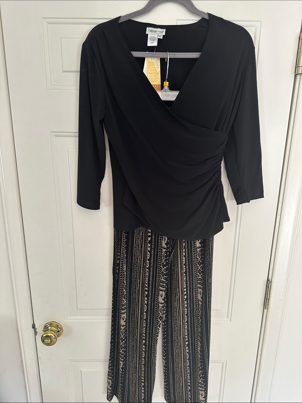 Coldwater Creek Black Top with black & gold pants.